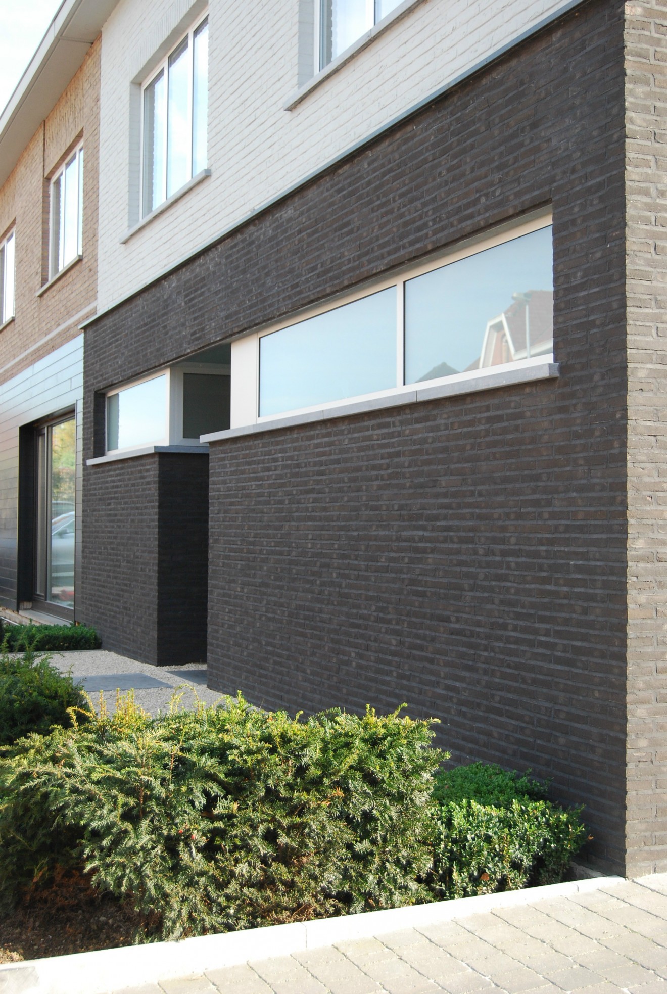 Architect- en ingenieursbureau Andries & Vuylsteke - Verbouwing winkelpand naar gezinswoning 